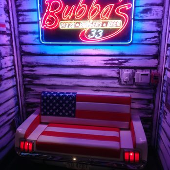 Bubba's 33 - Cool seat for waiting for tables (note: No one sitting there, so come on it!). - American Near Me - Wesley Chapel, Florida