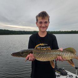 Spider Shores Resort - My son enjoying his catch and release fish!!