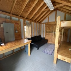 Vermont Freedom Adult Only Campground - Inside of the bunkhouse - has a heater and lights/electrical sockets