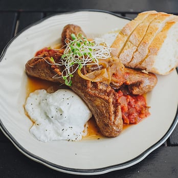 Hillside Farmacy - bangers and eggs - New American Near Me - Austin, Texas