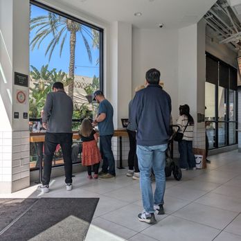 Shake Shack Irvine Spectrum - Customers placing their orders at the kiosks - Burgers Near Me - Irvine, California Shake Shack Irvine Spectrum - Customers placing their orders at the kiosks - Burgers Near Me - Irvine, California