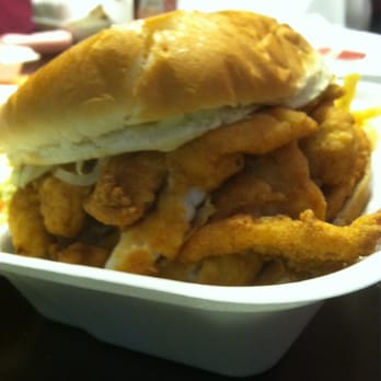 The Bantam Chef - Side view of fish sandwich. You got to take some out to get your mouth around it. This place is good. - Seafood Near Me - Bunnell, Florida The Bantam Chef - Side view of fish sandwich. You got to take some out to get your mouth around it. This place is good. - Seafood Near Me - Bunnell, Florida