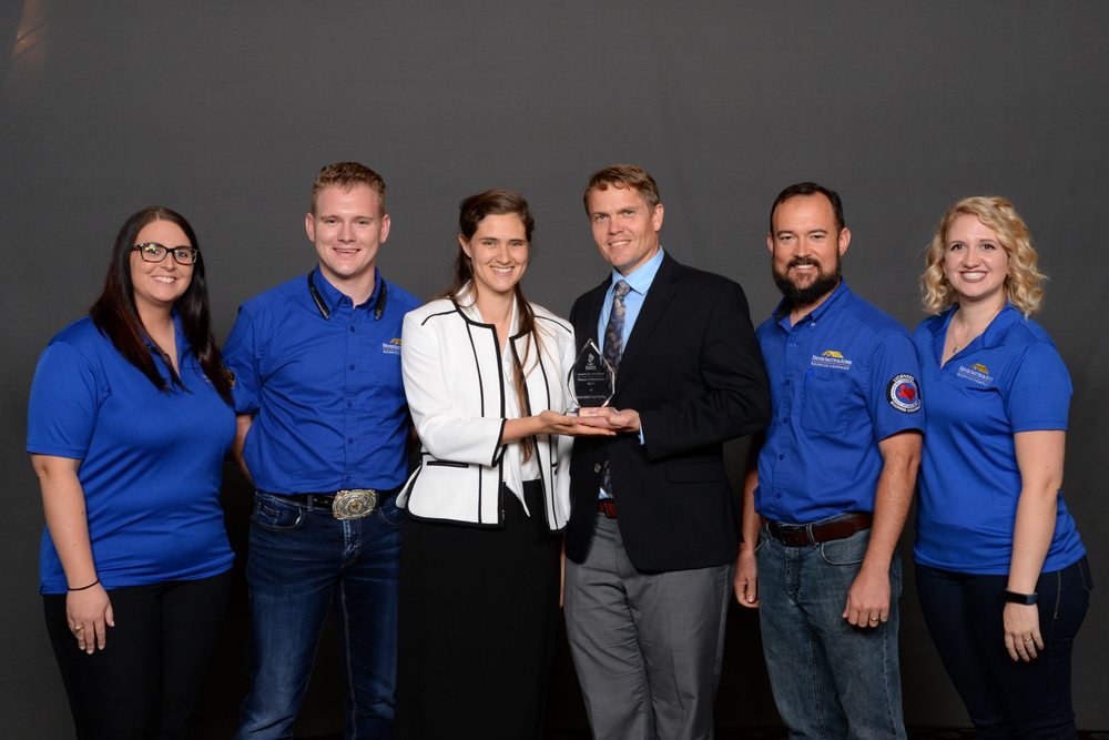 Slide of Ernie Smith & Sons Roofing