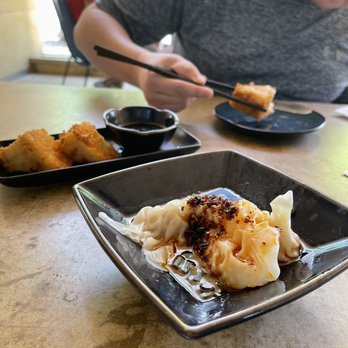 Wu Chow - Sichuan Spicy Wontons and Crispy Turnip Cakes with sausage - Dim Sum Near Me - Austin, Texas Wu Chow - Sichuan Spicy Wontons and Crispy Turnip Cakes with sausage - Dim Sum Near Me - Austin, Texas