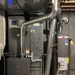 Change in the Weather HVAC - 80% 125,000 Variable speed, two stage Rheem furnace, 14 seer, Rheem air conditioner, and Rheem 50 gallon water heater.