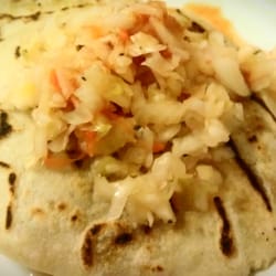 Pupusa revuelta and flower