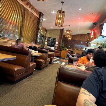 Dot Coffee Shop - The three tables including us. - American Near Me - Houston, Texas