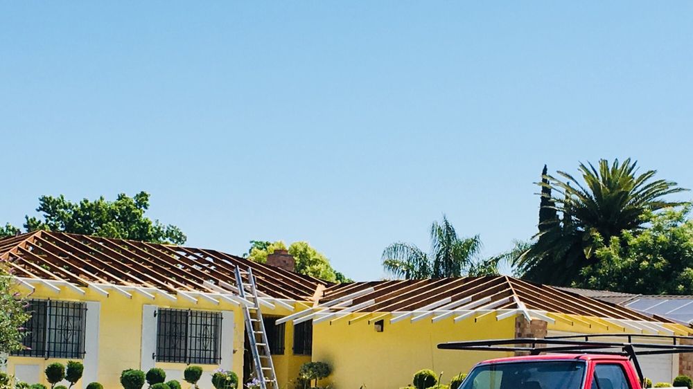 Slide of Signature Roofing