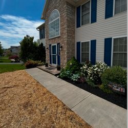 Keystone Design & Build - beautiful concrete walkway to the front door