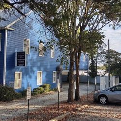 Please, park under our blue building, enter through side door dearest that carport. Suite 300 is upstairs through the farthest right door.