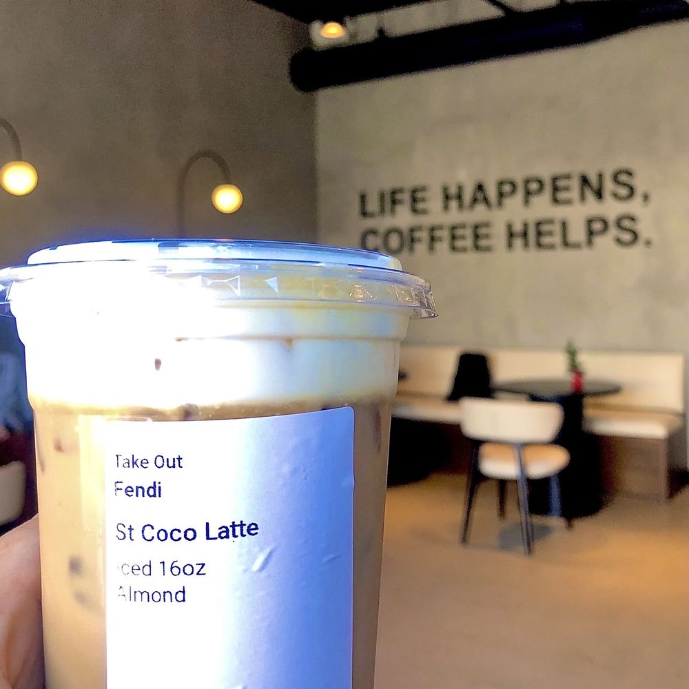 Saint Coco Coffee Bar - signature drink: Iced Saint Coco Latte with cardamom, almond milk and vanilla cream - Coffee & Tea Near Me - San Diego, California Saint Coco Coffee Bar - signature drink: Iced Saint Coco Latte with cardamom, almond milk and vanilla cream - Coffee & Tea Near Me - San Diego, California