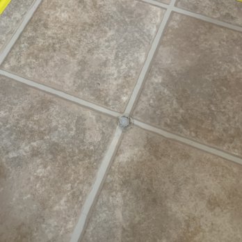 American Leak Detection - Where he drilled and hit the water line. - Plumbing Near Me