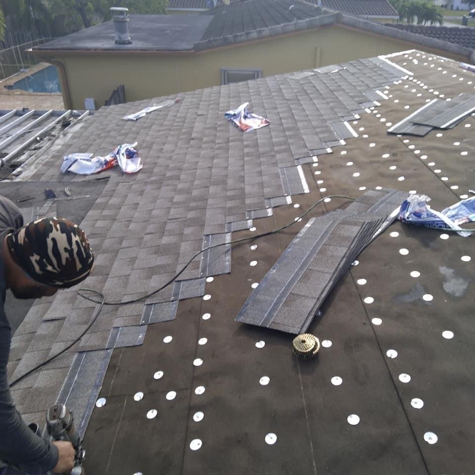 Slide of Dynasty Roofing