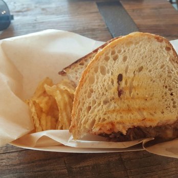 Mason & Dixie - The Brisket Grilled Cheese. Think it had Havarti, Fontina and Brie and BBQ Brisket on Buttery Grilled Sourdough. Definitely the real MVP! - Southern Near Me - Grapevine, Texas