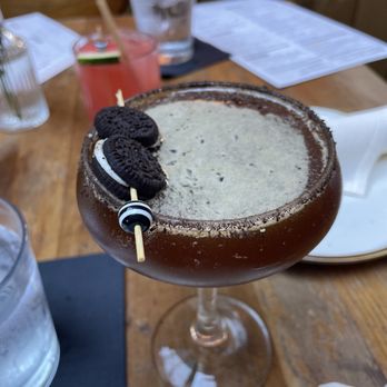 Madison - Oreo Espresso Martini $18 (Local's Only Vodka, espresso, Oreo syrup, Giffard vanilla de Madagascar liquor, creme de cacao liquor, oreo rim) - Italian Near Me - San Diego, California Madison - Oreo Espresso Martini $18 (Local's Only Vodka, espresso, Oreo syrup, Giffard vanilla de Madagascar liquor, creme de cacao liquor, oreo rim) - Italian Near Me - San Diego, California