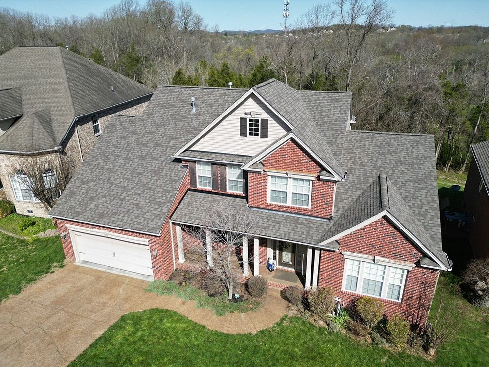 Slide of Gold Medal Roofing Company