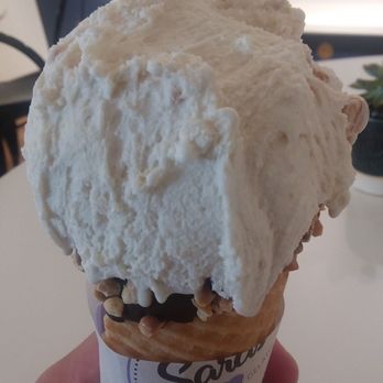 Sara's Artisan Gelato - Salted carmel gelato (with hazelnut coffee gelato underneath) on a dipped waffle cone. - Gelato Near Me - Green Bay, Wisconsin Sara's Artisan Gelato - Salted carmel gelato (with hazelnut coffee gelato underneath) on a dipped waffle cone. - Gelato Near Me - Green Bay, Wisconsin