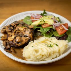 The Cactus Restaurant - Beef in mushrooms sauce with to sauces