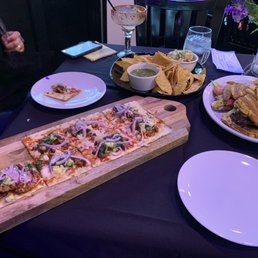 Al pastor flatbread, guac and salsa and steak jibarito Al pastor flatbread, guac and salsa and steak jibarito