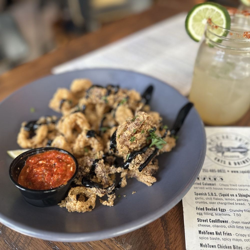 Squid Ink Eclectic Eats & Drinks - Calamari with a Santa Maria! Some of the best calamari out there! - Gastropubs Near Me - Mobile, Alabama Squid Ink Eclectic Eats & Drinks - Calamari with a Santa Maria! Some of the best calamari out there! - Gastropubs Near Me - Mobile, Alabama