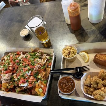 Moe's Original Bar B Que - Here, Redneck Nachos and Shrimp platter. Hit the spot - Barbeque Near Me - Wilmington, North Carolina Moe's Original Bar B Que - Here, Redneck Nachos and Shrimp platter. Hit the spot - Barbeque Near Me - Wilmington, North Carolina