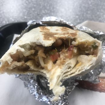 Carl's Jr - The grilled burrito was half steaming hot and half super cold. It seemed as they put it on the grill while frozen and never turned it. - Burgers Near Me - Castaic, California