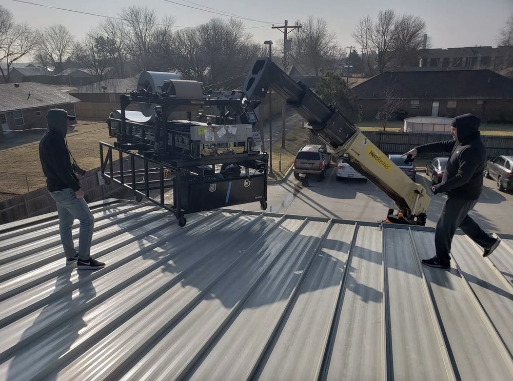 Slide of Harry's Roofing and Construction