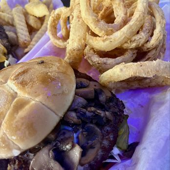 Fredericksburgers - Mushroom Swiss with onion rings - Burgers Near Me - San Antonio, Texas Fredericksburgers - Mushroom Swiss with onion rings - Burgers Near Me - San Antonio, Texas