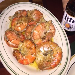 Rookies Sports Bar & Grill - Special request and the owner delivered. Prawns drowned in garlic butter. Very good and looking forward to more of this.