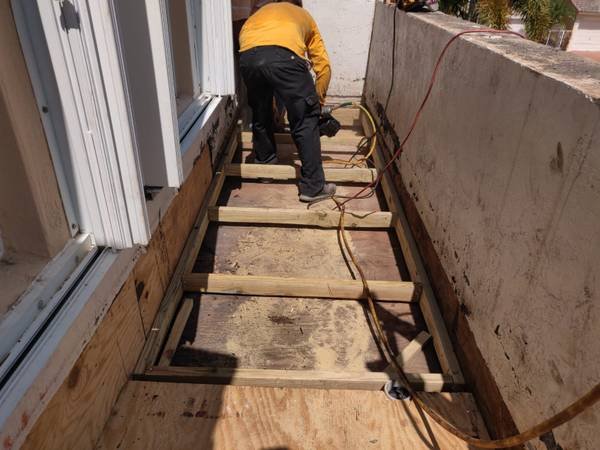 Slide of Roofing Clan