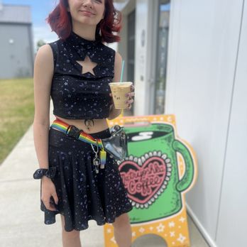 Matryoshka Coffee - Me at the shop sign with drink - Coffee & Tea Near Me - Nashville, Tennessee Matryoshka Coffee - Me at the shop sign with drink - Coffee & Tea Near Me - Nashville, Tennessee