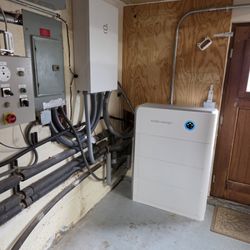 Auburn Solar - Sigen stack of 4  9KW batteries and inverter.  On wall is the control HUB