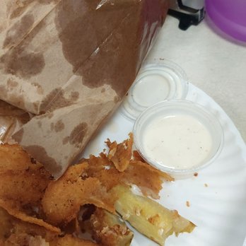 Highlander's Grill - Very greasy bag of fried pickles, which the coating does not stick too. - American Near Me - Hickory Hills, Illinois