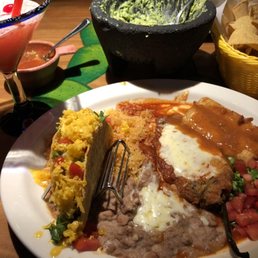 Combo with chicken chimichanga, 1 taco, and a chile relleno (poblano pepper stuffed with cheese and fried). Comes with rice & refried beans.