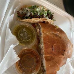 Super Bros - Half of a torta de lengua and one asada taco