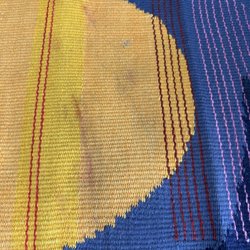 Renewal Claims Solutions - Ruined handmade rug--dye bleed.