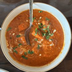 Chicken Tikka Masala a smooth tomato base sauce with just the right amount of seasoning and heat.