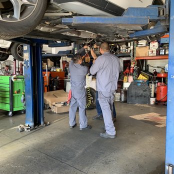 V Tech Auto Care - How many mechanics does it take to install an arm for a 2016 X1? Apparently 3. - Auto Repair Near Me - Pomona, California