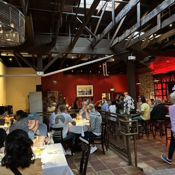 American Bites - a crowded restaurant with people sitting at tables - Bars Near Me - San Francisco, California American Bites - a crowded restaurant with people sitting at tables - Bars Near Me - San Francisco, California