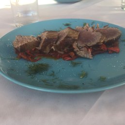 Tuna steak with red peppers