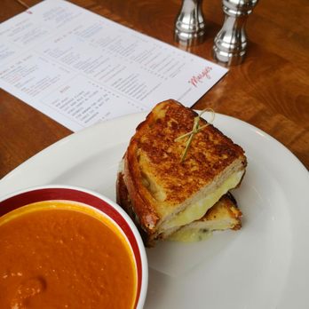 Margie's - Grilled Cheese - Cheddar, Gruyére, Oaxaca on Sourdough Bread with Tomato Soup - New American Near Me - Queens, New York Margie's - Grilled Cheese - Cheddar, Gruyére, Oaxaca on Sourdough Bread with Tomato Soup - New American Near Me - Queens, New York