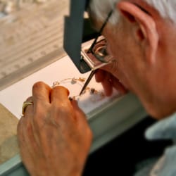 Stradley & Daughter - Jim the Jeweler working at his bench