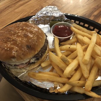 Taco Crave - Street burger. It has beef, a slice of ham, a slice of salami (? I think), cheese and avocado. There's a jalapeño hiding in that tray too. - Tacos Near Me - Bryan, Texas