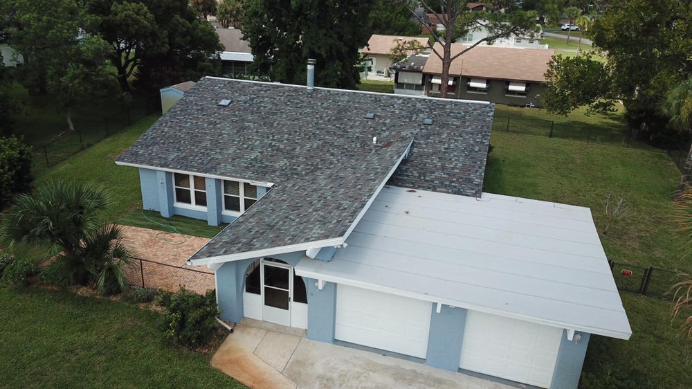Slide of EZ Roofing of Flagler County
