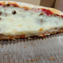 Filippi's Pizza Grotto Imperial Beach - Never seen Filippi's this flat and lacking with ingredients.