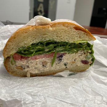 The Bread & Board - Seasonal chicken salad sandwich; arugula, tomato, chicken salad on ciabatta. Fantastic. Comes with a side salad. - Sandwiches Near Me - Jacksonville, Florida The Bread & Board - Seasonal chicken salad sandwich; arugula, tomato, chicken salad on ciabatta. Fantastic. Comes with a side salad. - Sandwiches Near Me - Jacksonville, Florida