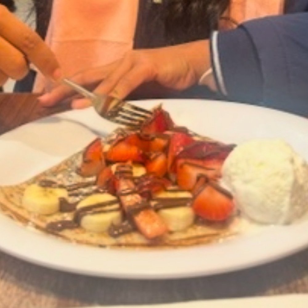 Nutella Cafe - Crepe with Nutella, strawberries, bananas and a scoop of vanilla ice cream. - Desserts Near Me - Chicago, Illinois Nutella Cafe - Crepe with Nutella, strawberries, bananas and a scoop of vanilla ice cream. - Desserts Near Me - Chicago, Illinois