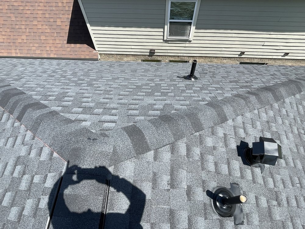 Slide of American Quality Roofers