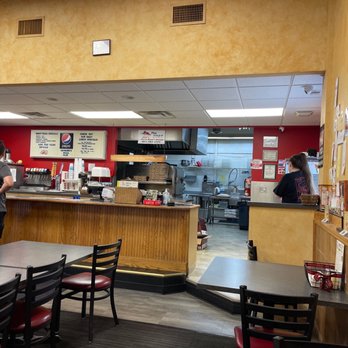 Raymono's Pizza Plus - customers at the counter - Pizza Near Me - Raymond, Nebraska Raymono's Pizza Plus - customers at the counter - Pizza Near Me - Raymond, Nebraska