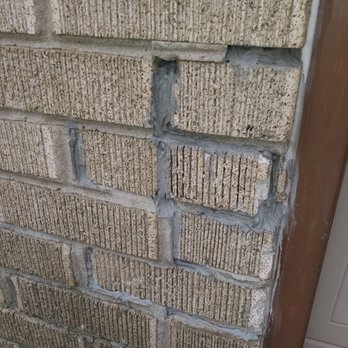 Instamax Construction & Remodeling - They knocked out bricks in the wall. They weren't supposed to. This is the way they repaired their mistake. - General Contractors Near Me - The Woodlands, Texas Instamax Construction & Remodeling - They knocked out bricks in the wall. They weren't supposed to. This is the way they repaired their mistake. - General Contractors Near Me - The Woodlands, Texas